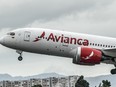 In this file photo taken on Aug. 28, 2019, an aircraft of Colombian company Avianca lands at El Dorado International Airport in Bogota.