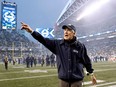 Head coach Pete Carroll of the Seattle Seahawks celebrates after defeating the Los Angeles Rams in overtime at Lumen Field on January 08, 2023 in Seattle, Washington.