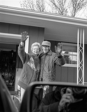 Deanna Dyckman's 2003 photo of her mother and father waving and waving at her home in Sioux City, Iowa, is part of Leaving and Waving, a new show at Polygon Gallery.