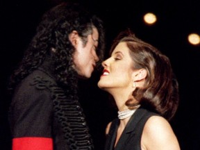 Michael Jackson and Lisa Marie Presley stare into each other's eyes at the 11th Annual MTV Video Music Awards in New York City, Sept. 8, 1994.