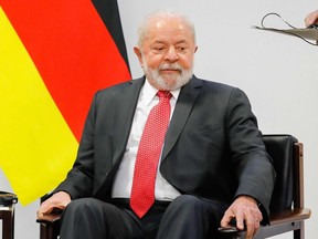 Brazilian President Luiz Inacio Lula da Silva gestures during a meeting with German Chancellor Olaf Scholz (out of frame) at the Planalto Palace in Brasilia on Jan. 30, 2023.