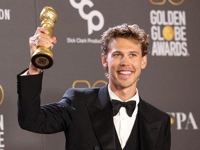 Austin Butler poses with his award for Best Actor in a Drama Motion Picture for "Elvis"  at the 80th Annual Golden Globe Awards in Beverly Hills, California, U.S., January 10, 2023.