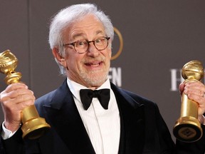 Steven Spielberg poses with his awards for Best Director in a Motion Picture and Best Picture Drama for 'The Fabelmans' at the 80th Annual Golden Globe Awards on Jan. 10.