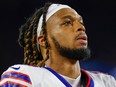 Buffalo Bills defensive back Damar Hamlin leaves the field after an NFL football game against the New England Patriots, Thursday, Dec. 1, 2022, in Foxborough, Mass. Hamlin was in critical condition early Tuesday, Jan. 3, 2023, after the Bills say his heart stopped following a tackle during the Monday Night Football game, which was indefinitely postponed.