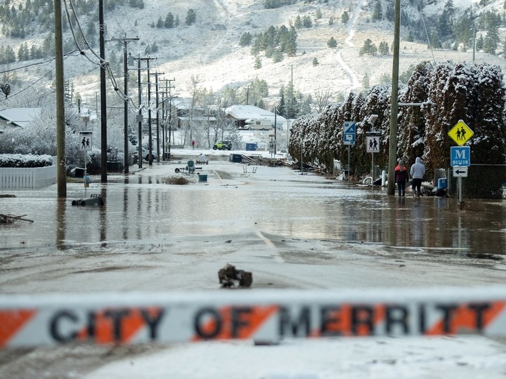  Flood waters cover a neighborhood a day after severe rain prompted the evacuation of the city of 7,000 in Merritt, British Columbia, Canada November 16, 2021.