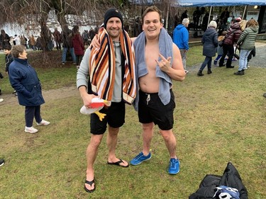 Paul Degroot (left) and Max Sheppard (right) at the 2023 Penguin Plunge in Deep Cove on January 1, 2023.