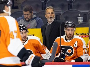 Philadelphia Flyers head coach John Tortorella talks to his players during the first period against the New York Islanders at Wells Fargo Center.