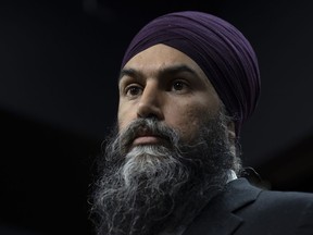 New Democratic Party leader Jagmeet Singh listens to a question during an availability on Parliament Hill, Thursday, January 19, 2023 in Ottawa. Singh says he will call on the House of a Commons to hold an emergency debate on the privatization of health care.