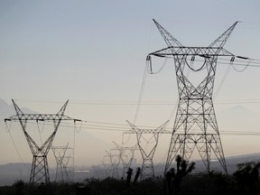 A general view shows high voltage power lines owned by Mexico's state-run electric utility known as the Federal Electricity Commission (CFE), in Santa Catarina, on the outskirts of Monterrey, Mexico February 9, 2021. REUTERS/Daniel Becerril