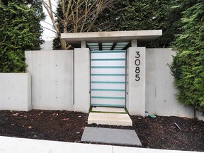 The front entrance might be unassuming, but behind the gates at 3085 Point Grey Rd. is B.C.'s most expensive property.