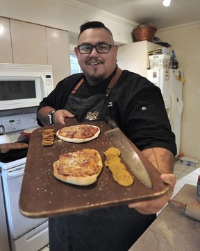 Squamish Nation chef Paul Natrall of Mr Bannock Indigenous Cuisine with his bannock pizza in West Vancouver.