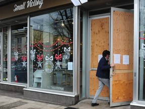 Small Victory Bakery on South Granville Street in downtown Vancouver was recently vandalized and has its window boarded up.