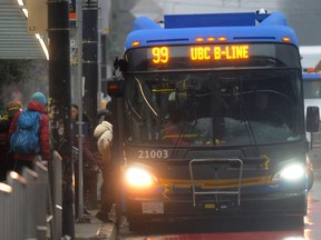 File photo of a bus at the busy Broadway-Commercial SkyTrain station.