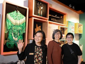 From left: April Liu, Ramona Mar and Susanna Ng are co-curators of the Raised in Chinatown exhibit at the Chinatown Storytelling Centre.