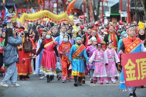 Children in the the first Lunar New Year Parade in Vancouver since before COVID-19.