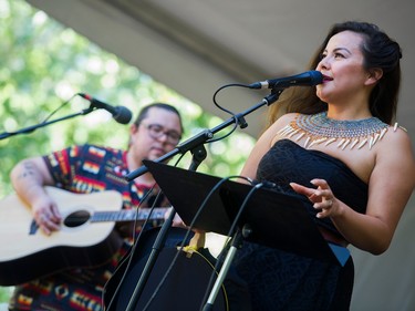 VANCOUVER. July 13 2018.  L-R. Quantum Tangle's Greyson Gritt and Tiffany Ayalik  perform at the 41st annual Vancouver Folk Music Festival, at Jericho Beach Vancouver, July 13 2018.