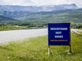 A sign opposing coal development in the eastern slopes of the Livingston range southwest of Longview, Alta., Wednesday, June 16, 2021. The Alberta government is refusing to release information on toxic contaminants in snowpacks downwind from mountaintop removal coal mines.