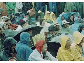 JULY 16, 1989 -- Rain soaked fans at the Folk Fest,