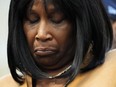 RowVaughn Wells, mother of Tyre Nichols, who died after being beaten by Memphis police officers, reacts at a news conference with civil rights Attorney Ben Crump in Memphis, Tenn., Friday, Jan. 27, 2023.