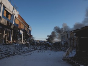 Plumes of smoke rise from a Russian strike during a 36-hour ceasefire over Orthodox Christmas declared by Russian President Vladimir Putin, as Russia's attack on Ukraine continues, from the frontline Donbas city of Bakhmut, Ukraine, January 7, 2023. REUTERS/Clodagh Kilcoyne