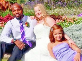 Jamaal Johnson on his wedding day in 2018 with wife Courtney and daughter Janai. FAMILY PHOTO