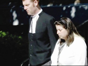 Kaela Mehl, accompanied by her lawyer, leaves Victoria courthouse on Thursday, Sept. 21, 2017. (Image is a still from a video.)