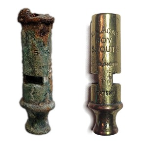 A whistle found with the remains of Cpl.  Percy Howart.  The whistle was later restored (right) by Christian Cousin of the Commonwealth War Graves Commission.