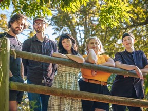 Only A Visitor is a Vancouver quintet, from left front, Celina Kurz (vocals); Robyn Jacob (vocals, keys); and Emma Postl (vocals); from left background, Kevin Romain (drums); and Jeff Gammon (bass). They have a new album out on Mint Records, titled Decay.
