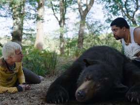 Aaron Holliday (left), O’Shea Jackson, Jr. and a big ol' bear in Cocaine Bear.
