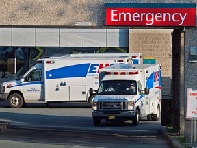 Paramedics are seen at the Dartmouth General Hospital in Dartmouth, N.S. on July 4, 2013.