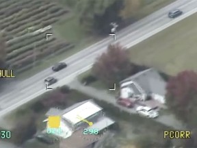 A driver (top left) can be seen passing one of several vehicles on the left as he fled police following an attempted traffic stop in Abbotsford on Oct. 21, 2021.