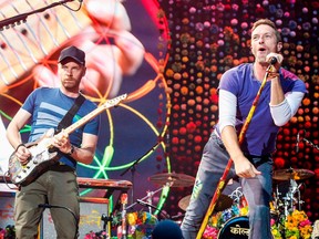 Coldplay, seen in this 2017 file photo, will play Seattle and Vancouver back-to-back in September, but what fans have to pay for tickets in the two cities varies by a wide margin.