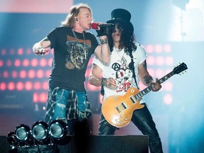 Axl Rose (left), lead singer of the rock band Guns N' Roses, performs with Slash at Parken Stadium, Copenhagen, Denmark, June 27, 2017.