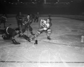 October 1954. John McGinnis photo from a game between the Vancouver Canucks and the Victoria Cougars.