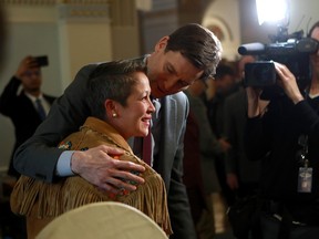 Former minister of tourism Melanie Mark announces her resignation as she is joined by Premier David Eby during a press conference following question period at the legislature in Victoria, B.C., on Wednesday, February 22, 2023.