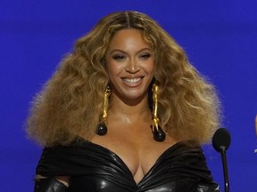 FILE - Beyoncé appears at the 63rd annual Grammy Awards in Los Angeles on March 14, 2021.