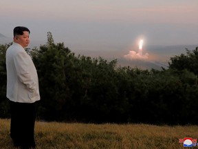 FILE PHOTO: North Korea's leader Kim Jong Un oversees a missile launch at an undisclosed location in North Korea, in this undated photo released on October 10, 2022 by North Korea's Korean Central News Agency (KCNA).