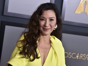 FILE - Michelle Yeoh arrives at the Governors Awards in Los Angeles on Nov. 19, 2022. Yeoh is nominated for an Oscar for best actress for her role in "Everything Everywhere All at Once."