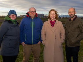 From left, Kim and Simon Pearce, Carolyn Cross and Jeremy Kerr, at the scene of a 2011 airplane crash.