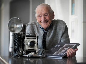 John McGinnis started at the Vancouver Province newspaper in 1946 and became a photographer a year later. His career spanned several decades, the results of which McGinnis turned into a book of his vintage images. He is pictured at his Langley home in 2020.