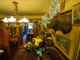 Robert McNutt in his unique antique-filled apartment in Vancouver.