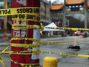 Parts of Vancouver's Chinatown was behind police tape Monday morning after a man was discovered dead near Pender and Carrall Streets after midnight.