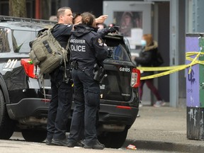 Vancouver police respond to a call on East Hastings Street on February 9, 2023.