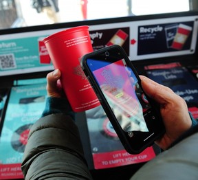 Scan the QR code on the side of the cup and follow the prompts.
