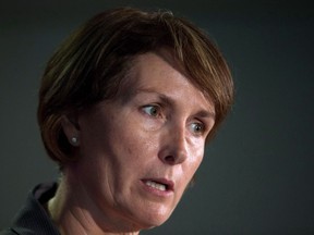 B.C. Representative for Children and Youth Mary Ellen Turpel-Lafond speaks during a news conference after releasing a joint report with the B.C. Information and Privacy Commissioner about cyberbullying, in Vancouver, B.C., on Friday November 13, 2015. The University of Regina says it has rescinded the honorary doctor of laws degree it awarded to Turpel-Lafond in 2003 as she faces questions about her Indigenous heritage.