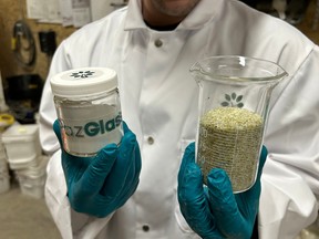 A Progressive Planet tech shows samples of their patented cement-replacement product PozGlass 100G at different stages of its production. The company hopes the final product will become commercially viable to reduce the use of carbon-intensive cement in making concrete.