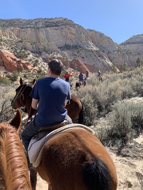 Horseback riding to Red Hollow Canyon.