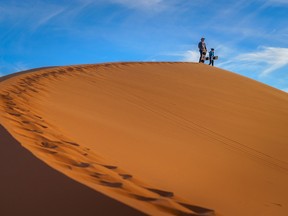 Sand boarding at Coral Pink Sand Dunes State Park.