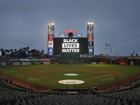 The words "Black Lives Matter" are displayed on the digital screen after the postponement of the game between the San Francisco Giants and the Los Angeles Dodgers at Oracle Park on August 26, 2020 in San Francisco, Calif.