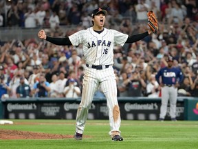 Shohei Ohtani #16 of Team Japan reacts after the final out of the World Baseball Classic Championship defeating Team USA 3-2 at loanDepot park on March 21, 2023 in Miami, Florida.